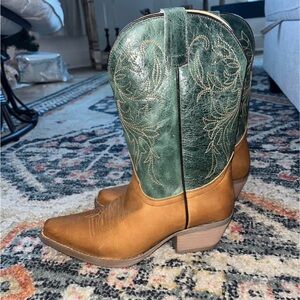 Teal and light brown cowboy boots. Never worn! Rubber sole and real leather.